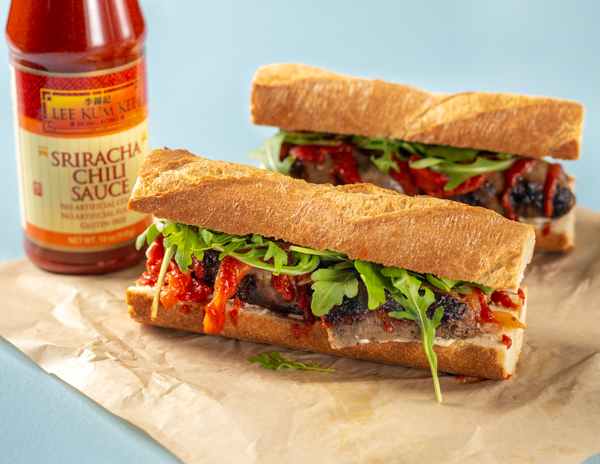 A grilled spicy sausage sandwich recipe with an added kick from Lee Kum Kee Sriracha