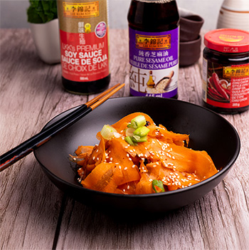 A carrot salad recipe with ribbon carrots and a Lee Kum Kee dressing.