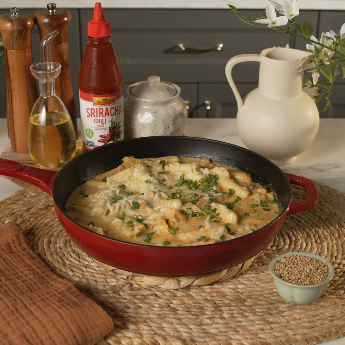 A comforting Rose Tteokbokki recipe made with Lee Kum Kee Sriracha.