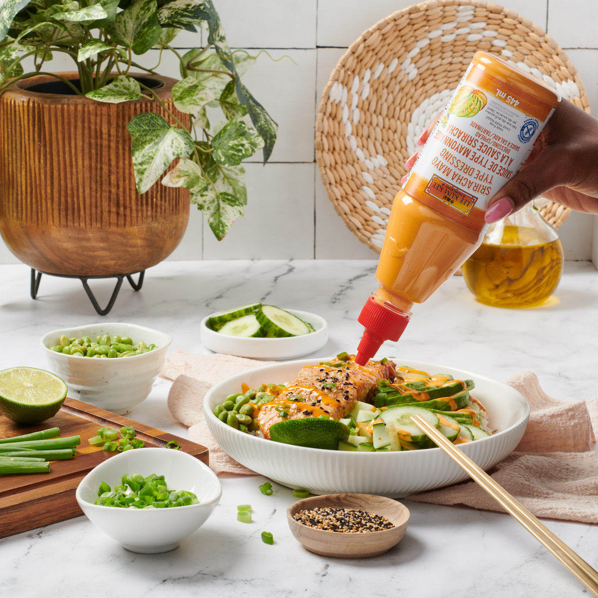 A salmon rice bowl recipe finished with Lee Kum Kee Sriracha Mayo.