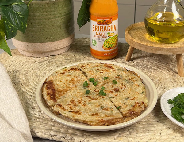 A scallion pancake quesadilla recipe with enoki mushrooms and a sriracha mayo dip.