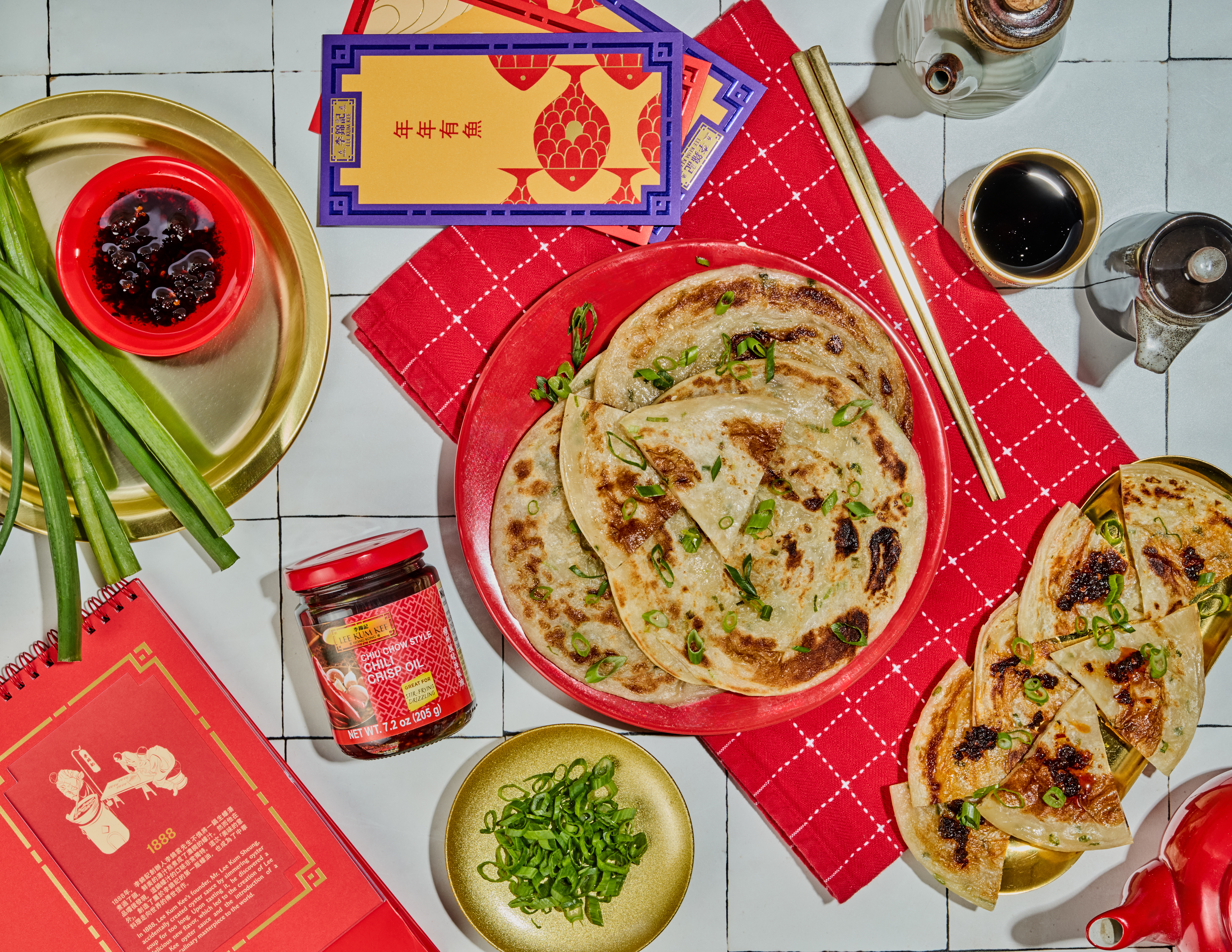 A scallion pancakes recipe for Lunar New Year with Lee Kum Kee Chili Crisp Oil for dipping.