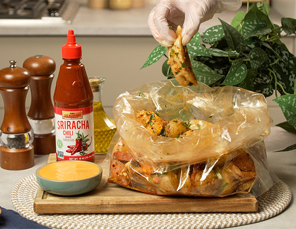 A seafood boil recipe with added dumplings and made with sriracha sauces.