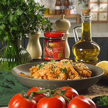 A spicy shrimp pasta recipe in a creamy tomato sauce made with Lee Kum Kee chili crisp.