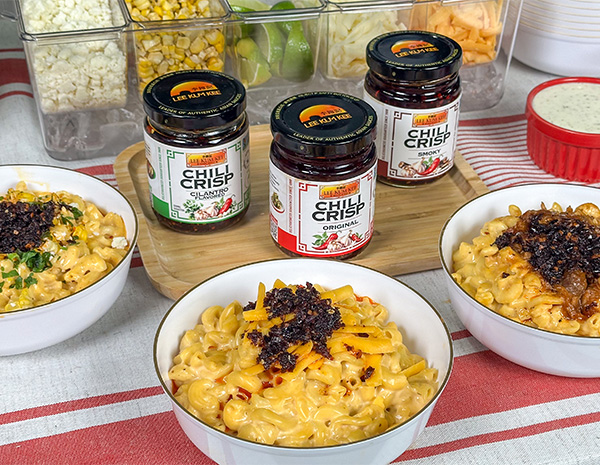 A set of loaded mac and cheese bowls, each made with a different Lee Kum Kee Chili Crisp.