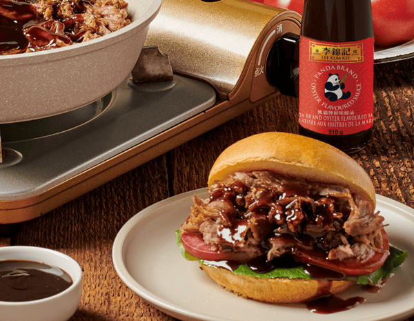 A slow cooker pulled pork recipe made with an oyster sauce marinade