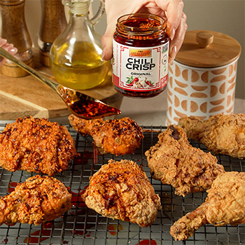 A southern style fried chicken recipe drizzled with chili crisp.