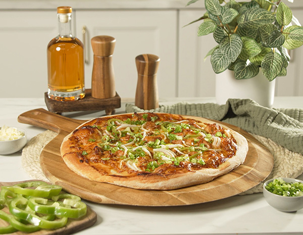 A bourbon chicken recipe served on pizza.