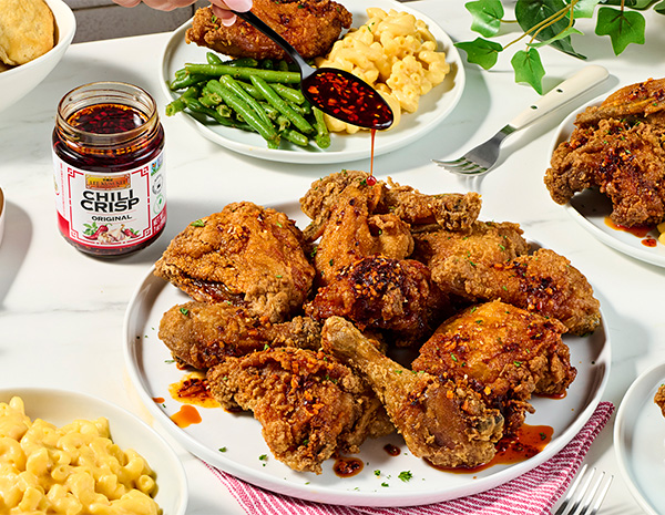 A spicy buttermilk fried chicken recipe topped with chili crisp.