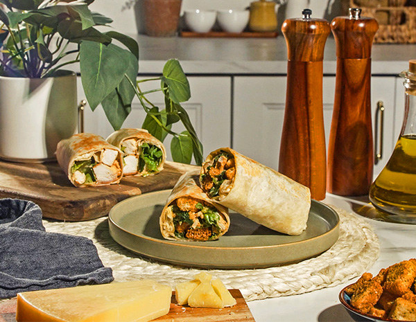 A Chicken Caesar wrap recipe made with Hoisin and Sriracha Mayo.