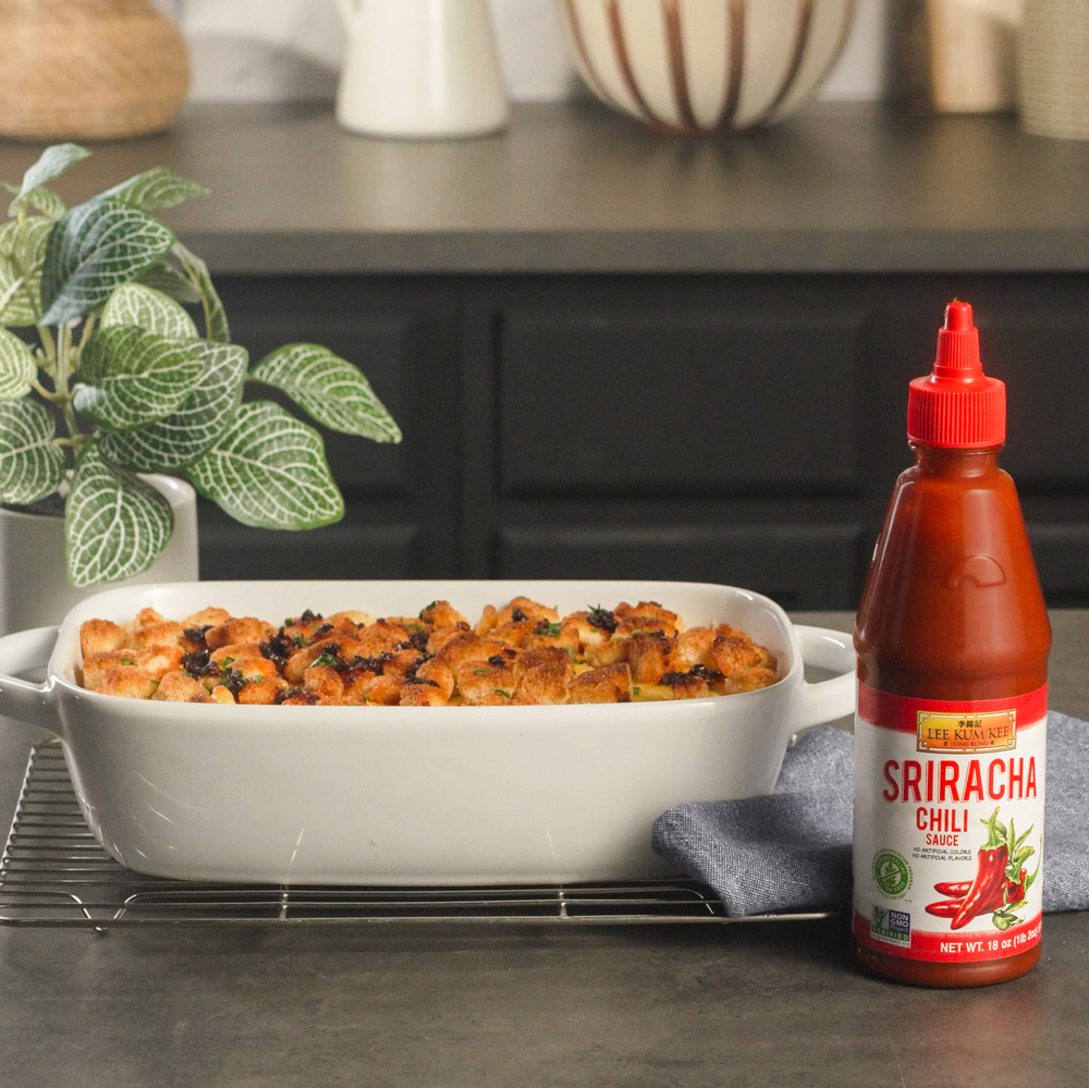 Baked Spicy Mac and Cheese Recipe with Croutons, drizzled with Lee Kum Kee Chiu Chow Style Chili Crisp Oil.