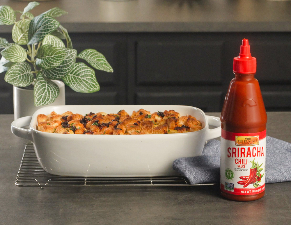 Baked Spicy Mac and Cheese Recipe with Croutons, drizzled with Lee Kum Kee Chiu Chow Style Chili Crisp Oil.