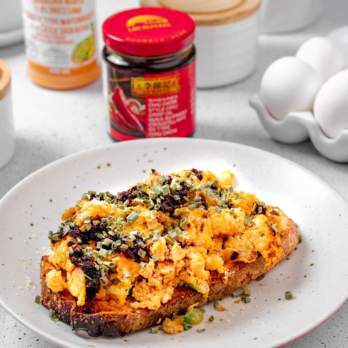 A spicy scrambled eggs recipe made with miso butter.