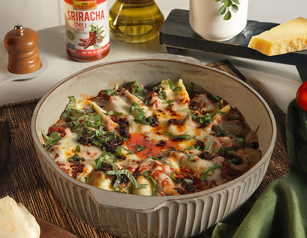 A stuffed shells recipe for spicy pasta made with Lee Kum Kee chili sauces.