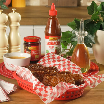 A sriracha hot honey mozzarella sticks recipe with Lee Kum Kee chili sauces.