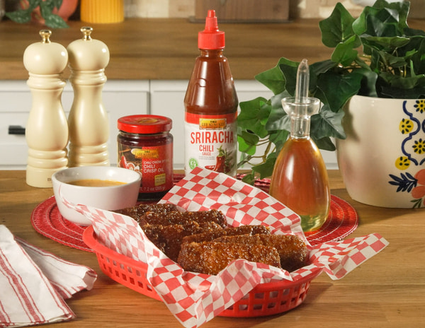 A sriracha hot honey mozzarella sticks recipe with Lee Kum Kee chili sauces.