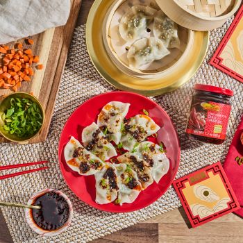 A steamed dumplings recipe for Lunar New Year with Lee Kum Kee Chili Crisp Oil dipping sauce.