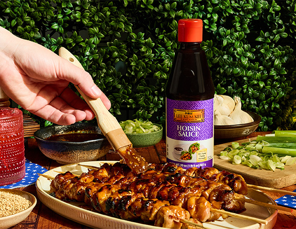 A sweet chili chicken skewers recipe brushed with a glaze of hoisin and chili crisp hot honey.