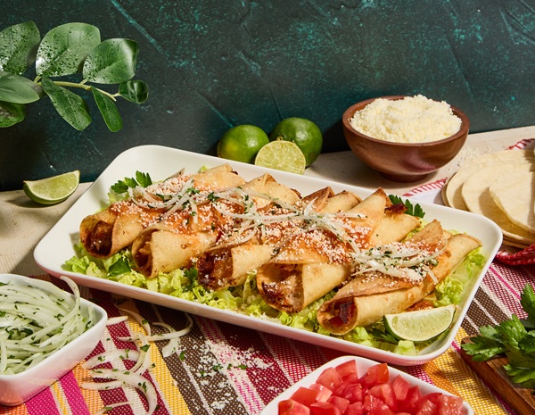 A Tacos Dorados recipe made with potatoes, chicken, and Lee Kum Kee Sauces.