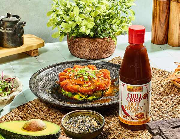 A tuna tartare recipe dressed with a chili crisp hot honey sauce, perfect for a dinner party or fancy appetizer.