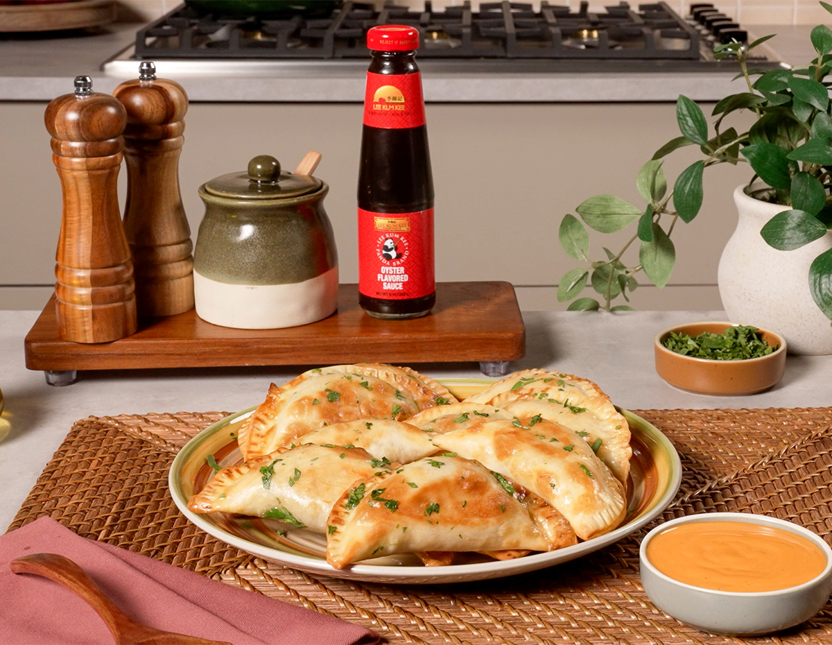A turkey pot pie filling stuffed inside empanadas with Sriracha Mayo for dipping.
