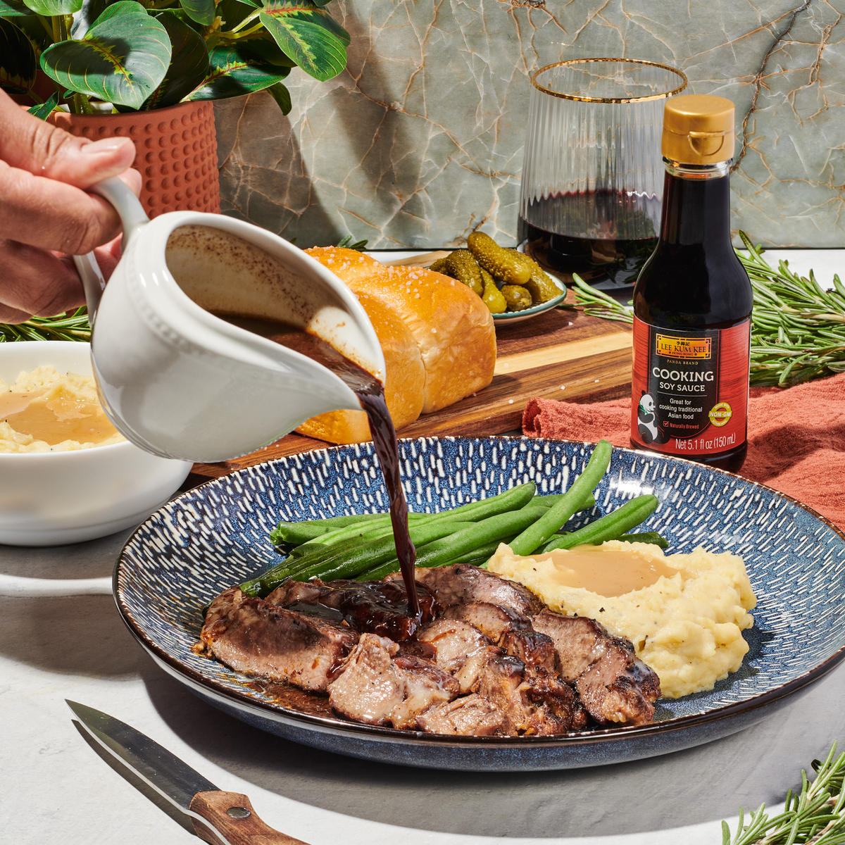 An umami garlic herb butter prime rib with au jus recipe made with Lee Kum Kee Minced Garlic.