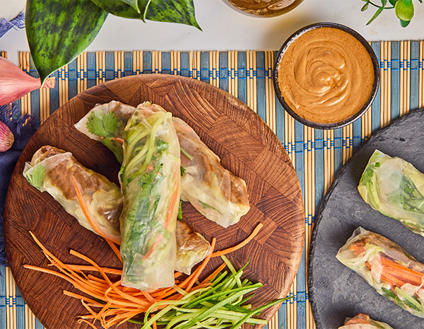 Vietnamese Spring Rolls served with a hoisin peanut dipping sauce.