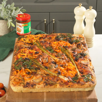 A vibrant garden focaccia recipe made with Lee Kum Kee chili sauces.