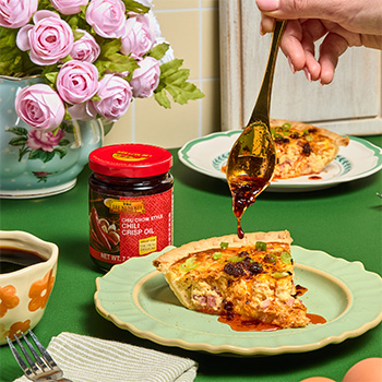 A ham and cheese quiche recipe with kimchi inside the quiche.