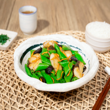 Sautéed Codfish with Black Garlic and Sugar Snap Peas