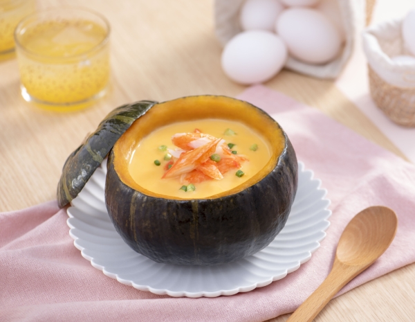 Steamed egg in whole pumpkin with crab meat