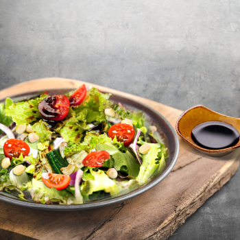 Organic salad with honey vinegar sauce