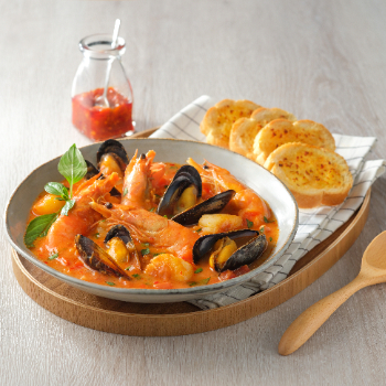 Spicy Tomato Seafood Stew with Garlic Bread