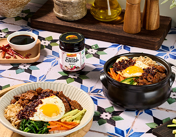 A Korean spicy pork bibimbap recipe finished with smoky chili crisp.