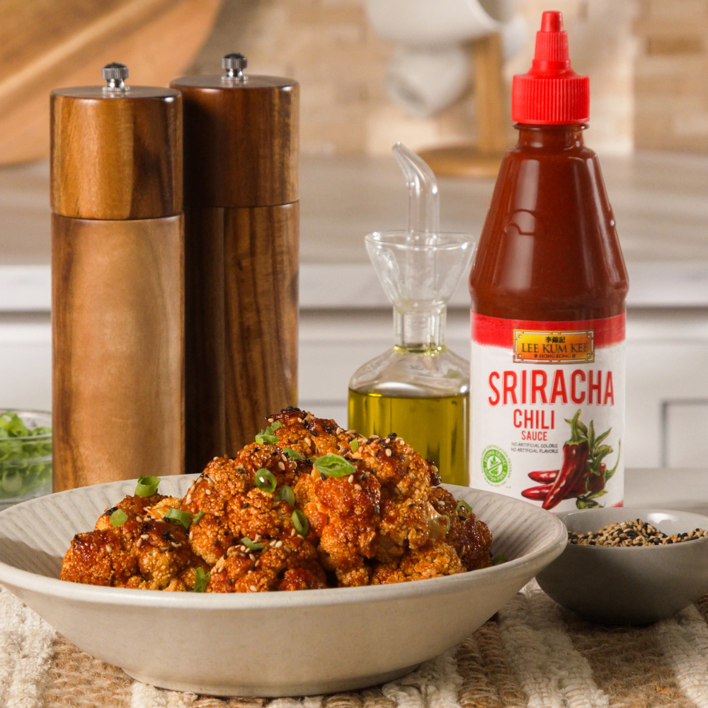 Baked Korean Style Cauliflower recipe, coated in a sauce spiced up with Lee Kum Kee Sriracha Chili Sauce.