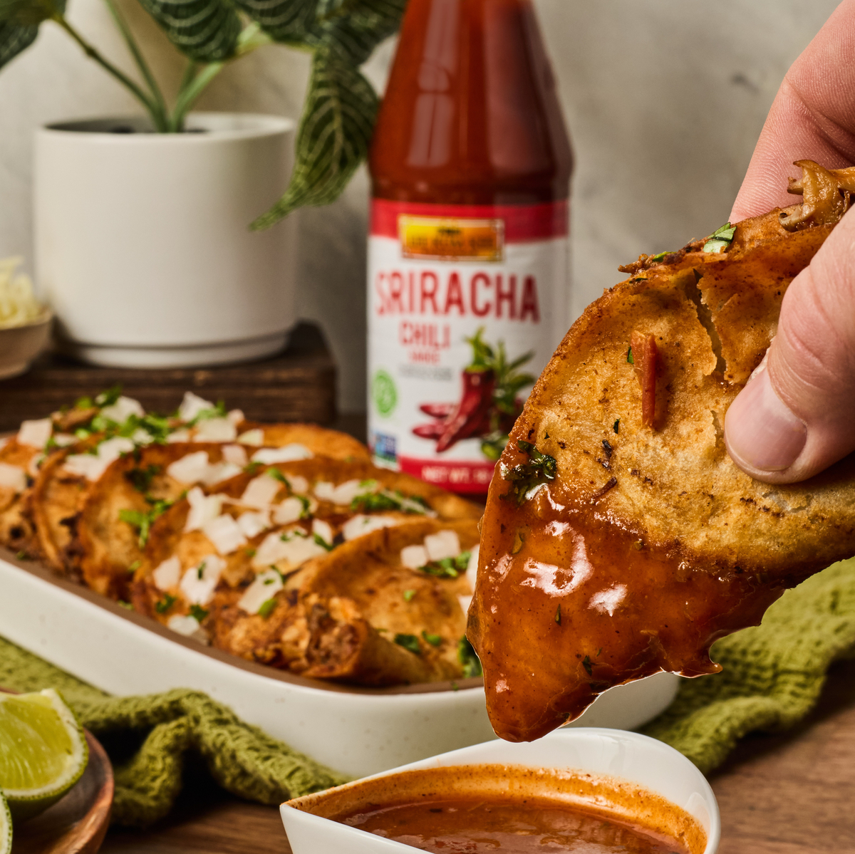 A vegan mushroom birria style tacos recipe made with Lee Kum Kee Sriracha Chili Sauce.