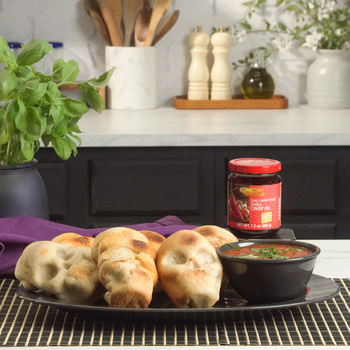 An easy pizza skulls recipe based on the viral pizza skulls from Bari Pizza and Pasta, with Lee Kum Kee Chiu Chow Chili Crisp Oil.