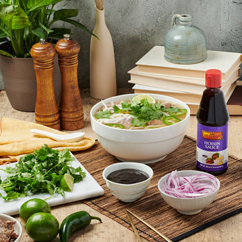 A pressure cooker pho recipe with brisket and Lee Kum Kee hoisin sauce.
