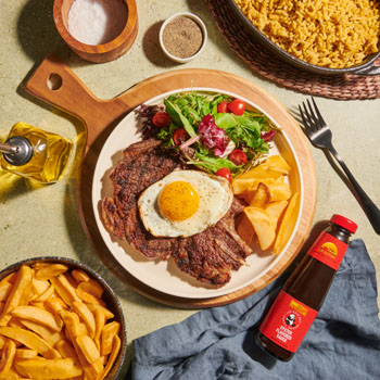Portuguese bitoque steak and side dishes