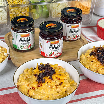 A set of loaded mac and cheese bowls, each made with a different Lee Kum Kee Chili Crisp.