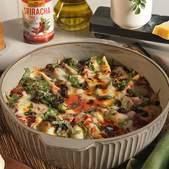 A stuffed shells recipe for spicy pasta made with Lee Kum Kee chili sauces.
