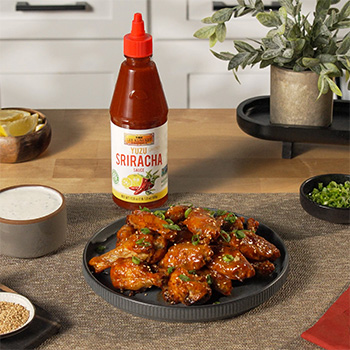 A buffalo chicken wings recipe with spicy Yuzu Flavored Sriracha Sauce.